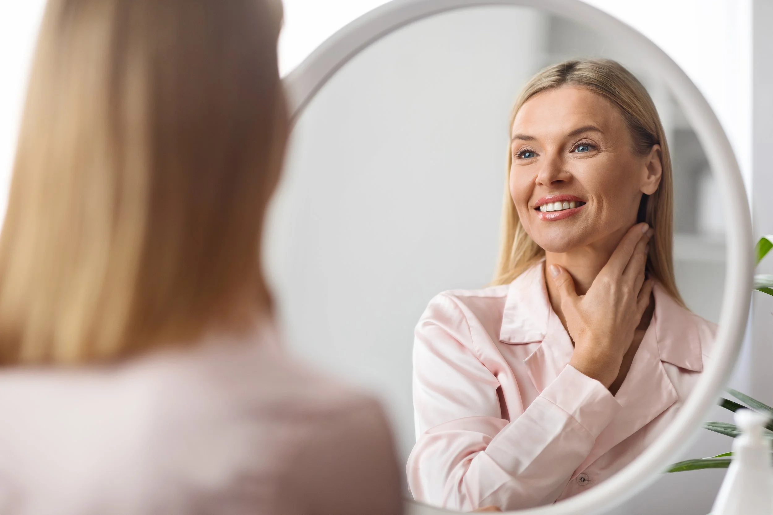 smiling woman after beautiful neck lift