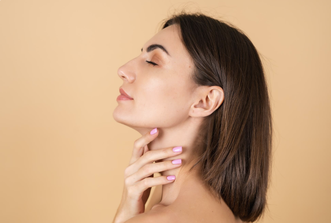 Profile view showing defined jawline from chin augmentation